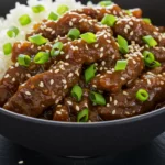 The final plated Easiest Mongolian Beef, a quick and delicious thin sliced steak recipe that's better than takeout.