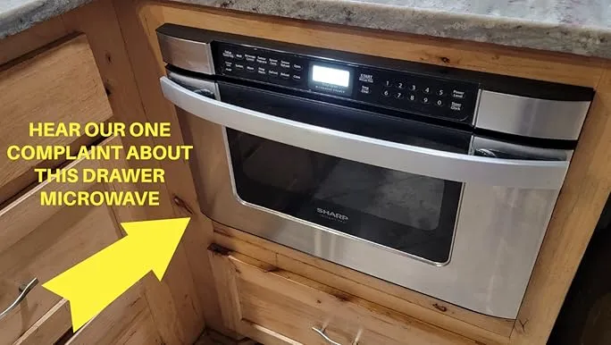 Open built-in convection microwave oven showing its interior, highlighting multi-functional cooking capabilities.