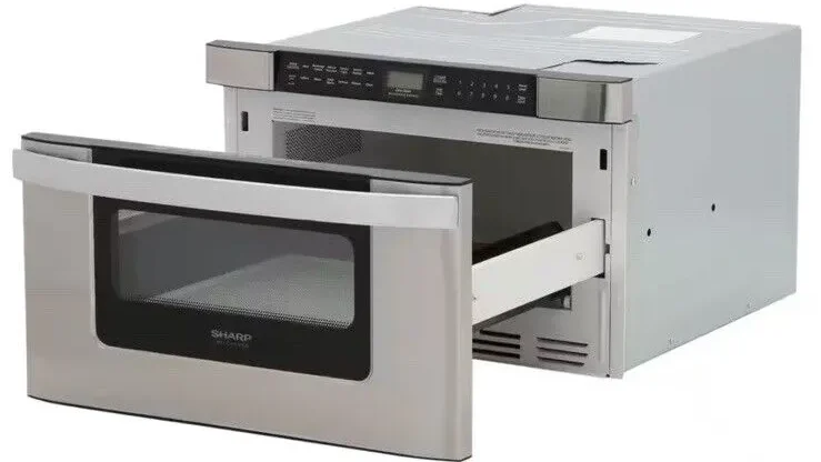 Sleek microwave drawer fully integrated into a dark kitchen cabinet, showcasing convenient lower installation.